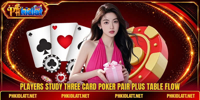 Players study three card poker pair plus table flow Players study three card poker pair plus table flow